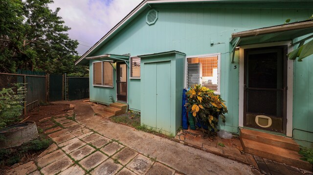 5118 Lawai Rd, Koloa, HI 96756 - view of home's exterior featuring entry steps and a patio area