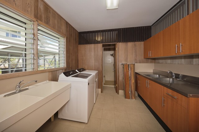 114 Kupaa St, Hilo, HI 96720 - laundry area with washer and dryer, cabinet space, and light tile patterned flooring