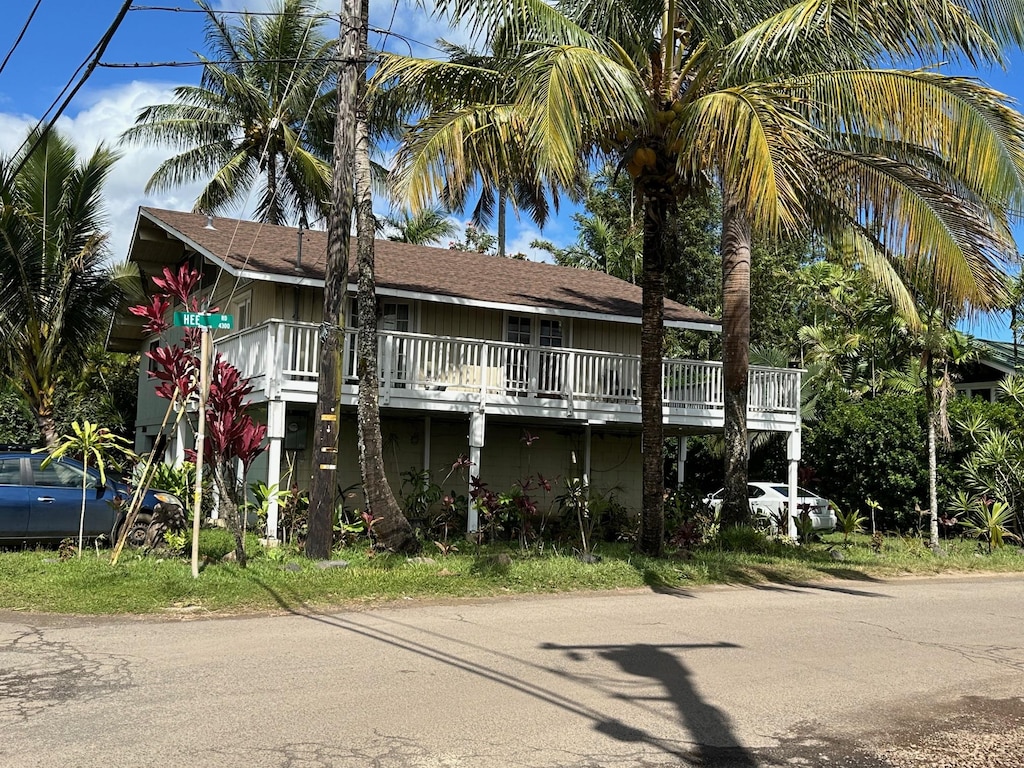 5404 Weke Rd, Hanalei, HI 96722 - beach home featuring a wooden deck and board and batten siding