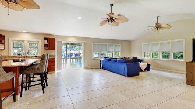 6573-E Puupilo Rd, Kapaa, HI 96746 - living room featuring ceiling fan, light tile patterned flooring, recessed lighting, baseboards, and high vaulted ceiling