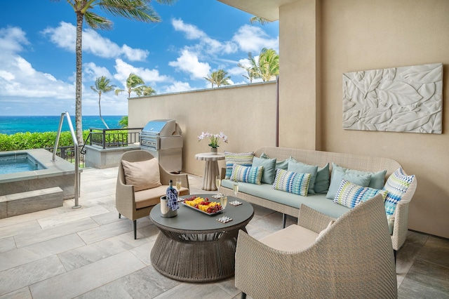 3770 Alaoli Way Unit 1002, Hokuala, HI 96766 - view of patio featuring outdoor lounge area, a hot tub, and a water view