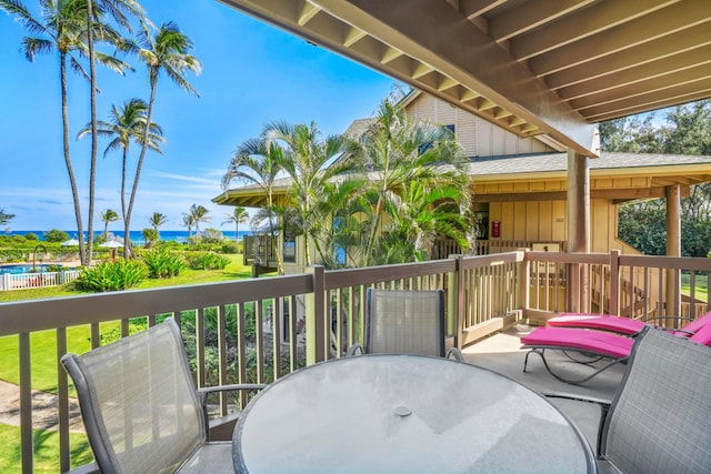 4460 Nehe Rd Unit 203, Lihue, HI 96766 - wooden terrace featuring outdoor dining area