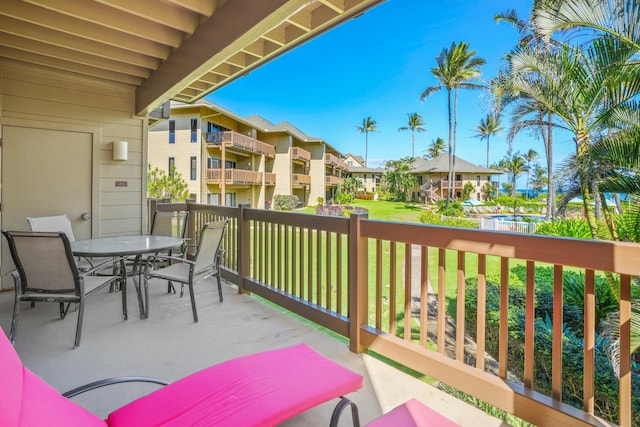 4460 Nehe Rd Unit 203, Lihue, HI 96766 - balcony featuring outdoor dining space and a residential view