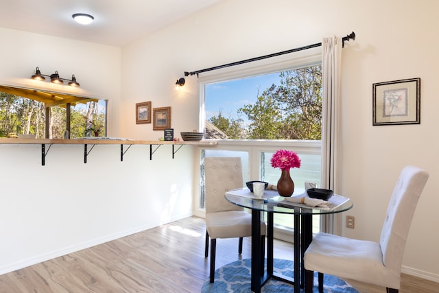 11-3246 Alaula St, Volcano, HI 96785 - dining area with wood finished floors, plenty of natural light, and baseboards