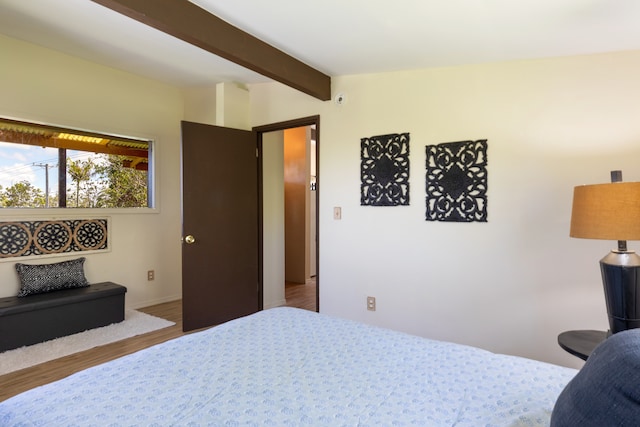 11-3246 Alaula St, Volcano, HI 96785 - bedroom with wood finished floors, beamed ceiling, and baseboards
