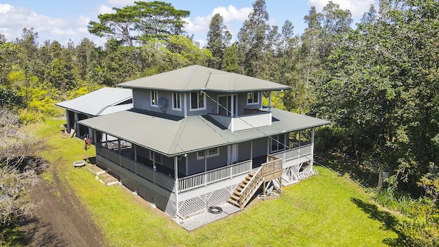16-1366 Ao Rd, Mountain View, HI 96771 - back of house with a yard, stairs, a balcony, and covered porch