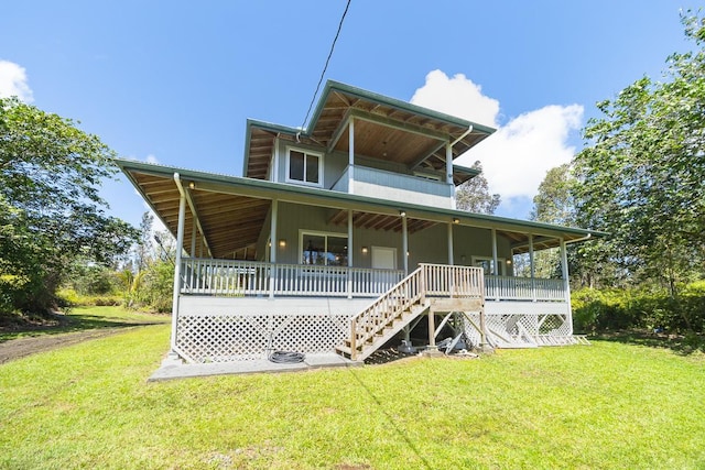 16-1366 Ao Rd, Mountain View, HI 96771 - back of property with a yard and stairs