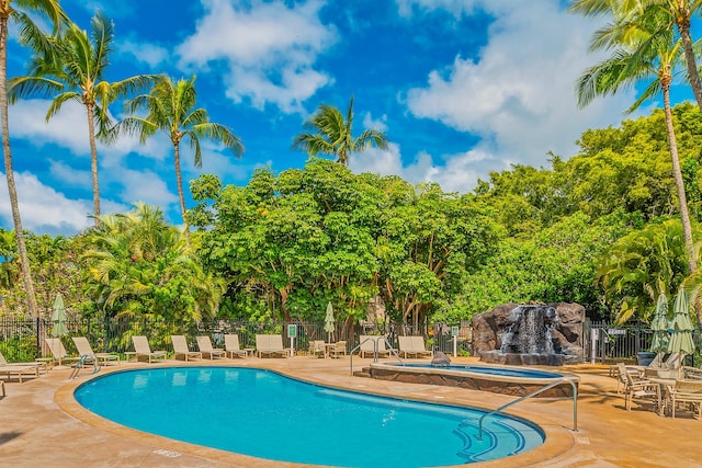 1901 Poipu Rd Unit 632, Koloa, HI 96756 - community pool featuring a community hot tub, a patio, and view of scattered trees