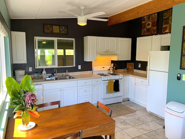 12-311 W Pohakupele Loop, Pahoa, HI 96778 - kitchen with white appliances, a sink, under cabinet range hood, a ceiling fan, and light countertops