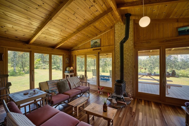 11-2860 Apele Rd, Mountain View, HI 96771 - sunroom / solarium featuring a wood stove and healthy amount of natural light