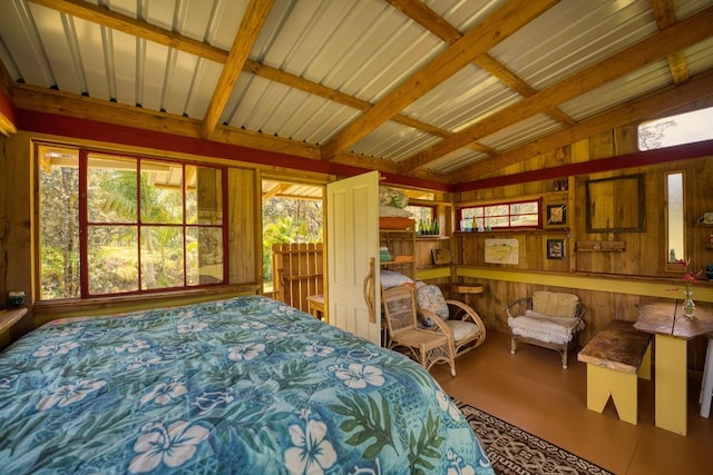 11-2860 Apele Rd, Mountain View, HI 96771 - bedroom featuring vaulted ceiling, multiple windows, and wooden walls
