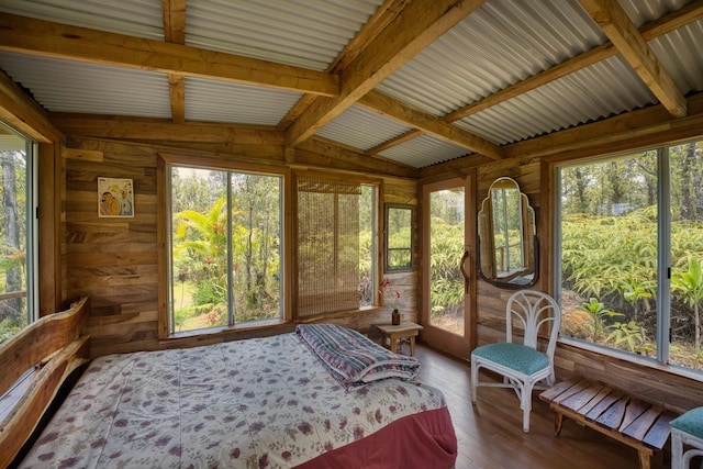 11-2860 Apele Rd, Mountain View, HI 96771 - sunroom with vaulted ceiling, wooden walls, and wood finished floors
