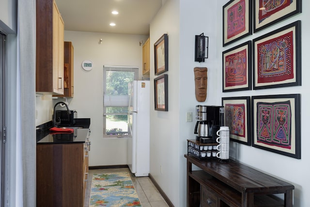 12-7124 Kalapana Kapoho Beach Rd, Pahoa, HI 96778 - kitchen featuring freestanding refrigerator, dark countertops, a sink, recessed lighting, and baseboards