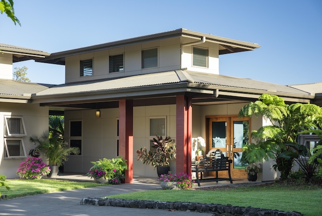 12-7124 Kalapana Kapoho Beach Rd, Pahoa, HI 96778 - view of front of home with stucco siding