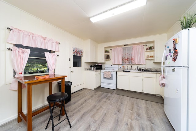 127 Kanoelani St Unit 1, Hilo, HI 96720 - kitchen featuring white appliances, open shelves, light wood finished floors, and white cabinets