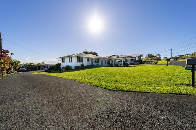 127 Kanoelani St Unit 1, Hilo, HI 96720 - ranch-style house featuring a front yard