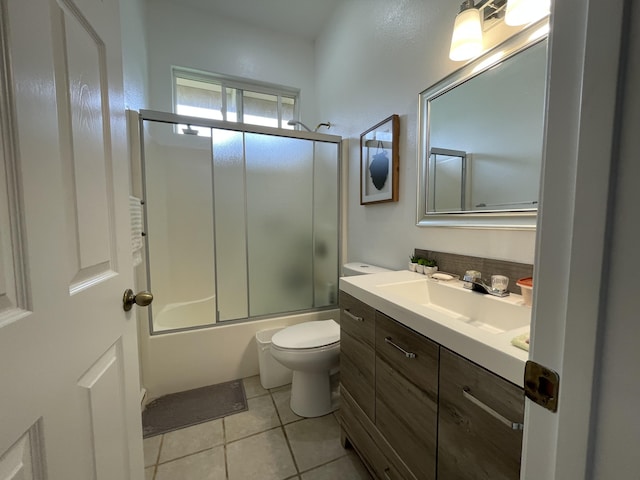 15-1765 28th Ave, Keaau, HI 96749 - bathroom featuring vanity, toilet, enclosed tub / shower combo, and tile patterned floors