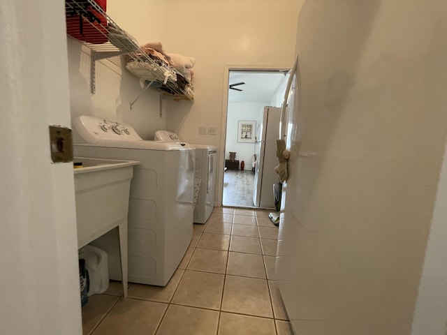 15-1765 28th Ave, Keaau, HI 96749 - laundry area featuring washing machine and dryer and light tile patterned flooring