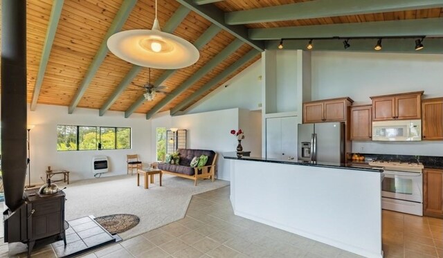 17-7860 Kulani Rd, Mountain View, HI 96771 - kitchen featuring white appliances, heating unit, open floor plan, dark countertops, and wood ceiling with exposed beams