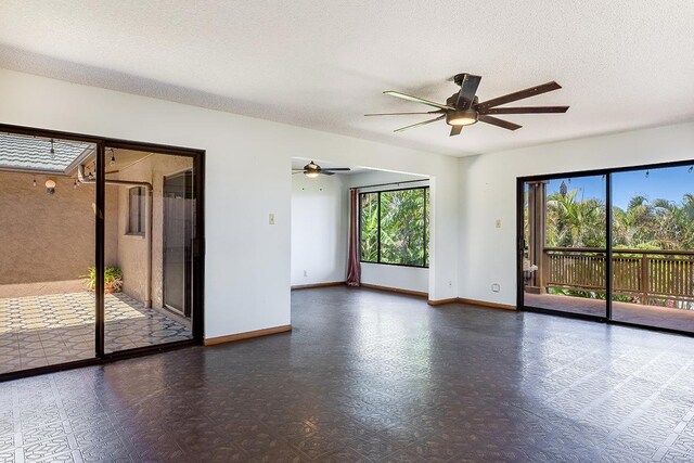 68-3753 Piki Pl, Waikoloa, HI 96738 - unfurnished room with baseboards, ceiling fan, and a textured ceiling