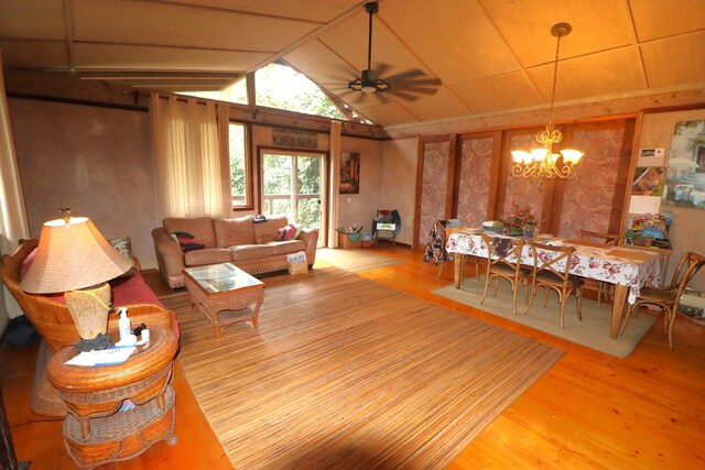 82-6286 Puuhonua Rd, Captain Cook, HI 96704 - living room with a chandelier, wood finished floors, vaulted ceiling, and ceiling fan