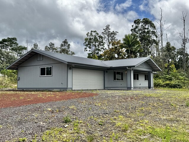16-2142 Kuhio Dr, Pahoa, HI 96778 - single story home featuring a metal roof, a garage, and driveway