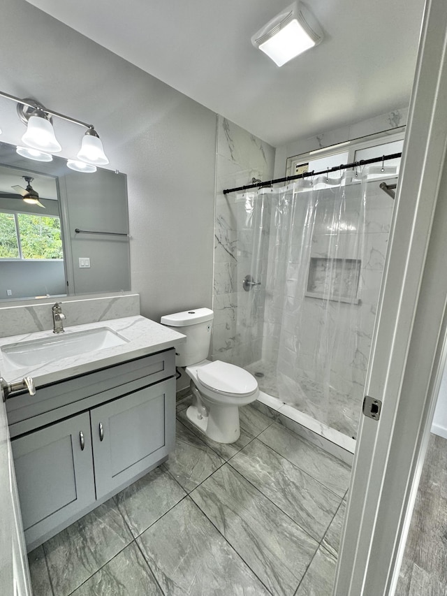 16-2142 Kuhio Dr, Pahoa, HI 96778 - full bathroom with vanity, marble finish floors, and a stall shower