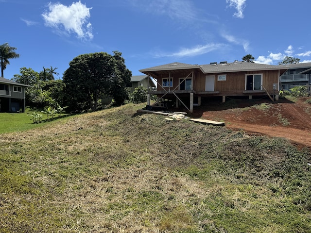 4443-B Ahopueo Dr, Kalaheo, HI 96741 - view of grassy yard featuring stairway
