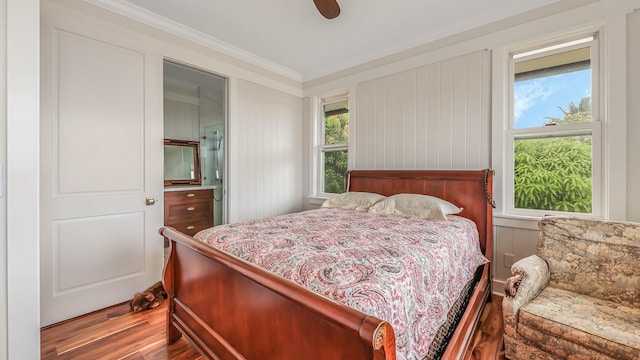 1778 Poipu Aina Pl Unit B, Koloa, HI 96756 - bedroom with wood finished floors and ornamental molding