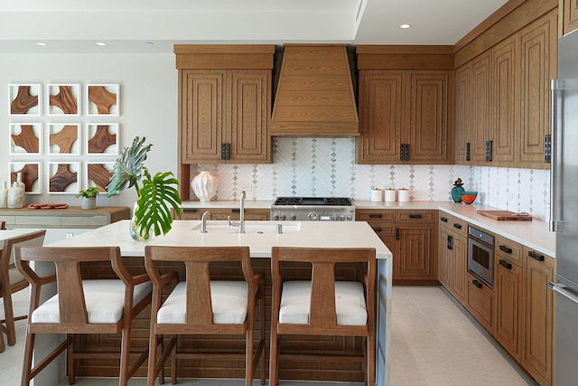 3770 Alaoli Way Unit 2006, Lihue, HI 96766 - kitchen featuring premium range hood, stainless steel appliances, light countertops, tasteful backsplash, and recessed lighting