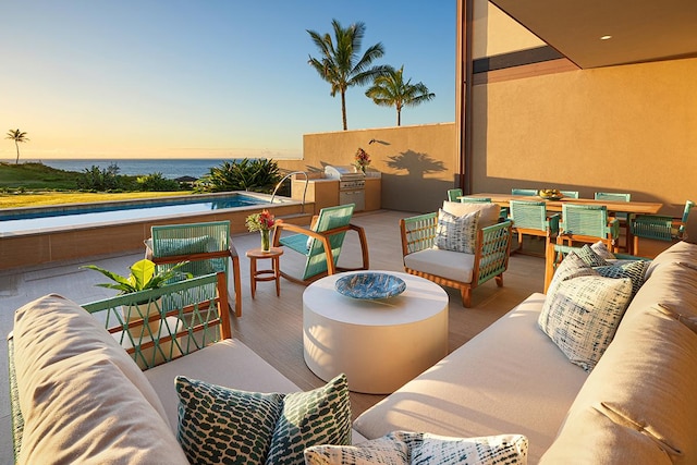 3770 Alaoli Way Unit 2006, Lihue, HI 96766 - patio terrace at dusk featuring an outdoor living space