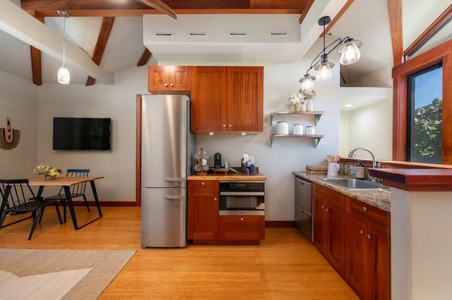 68-1051 Honokaope Way, Kamuela, HI 96743 - kitchen featuring appliances with stainless steel finishes, a sink, light wood-type flooring, baseboards, and open shelves