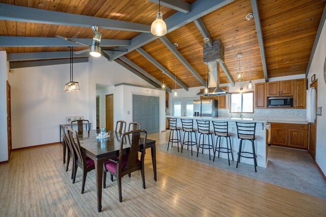 103 Puhili St, Hilo, HI 96720 - dining space with ceiling fan, light wood finished floors, baseboards, wooden ceiling with exposed beams, and high vaulted ceiling
