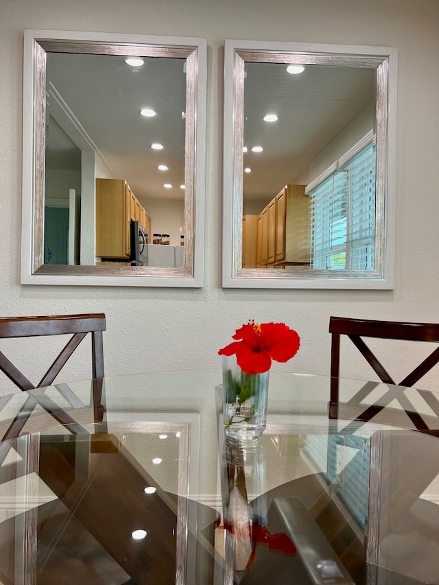74-5618 Palani Rd Unit M6, Kailua-Kona, HI 96740 - dining area view of stainless steel microwave, recessed lighting, and a textured wall
