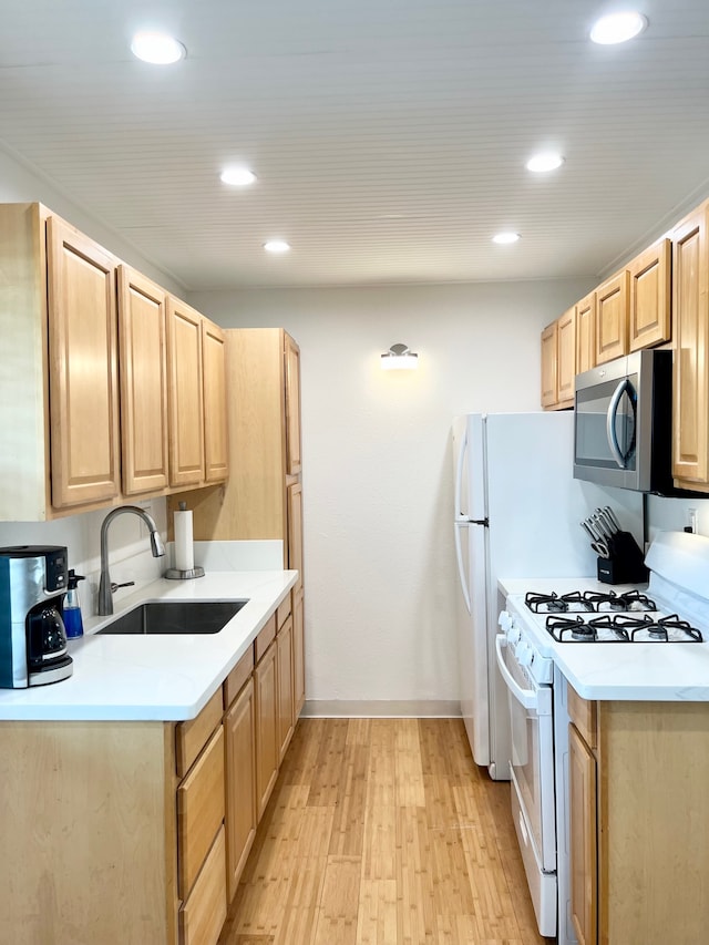 74-5618 Palani Rd Unit M6, Kailua-Kona, HI 96740 - kitchen featuring white appliances, a sink, light brown cabinets, baseboards, and recessed lighting