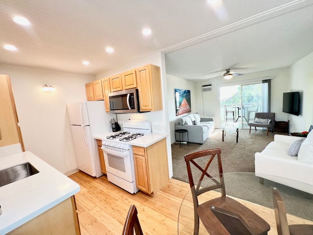 74-5618 Palani Rd Unit M6, Kailua-Kona, HI 96740 - kitchen with white appliances, light brown cabinetry, open floor plan, recessed lighting, and light countertops