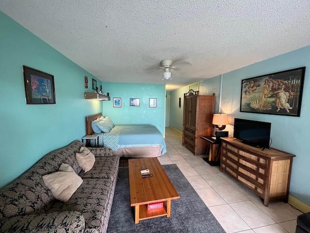 75-5776 Kuakini Hwy Unit 339, Kailua-Kona, HI 96740 - living room with a ceiling fan, light tile patterned flooring, and a textured ceiling