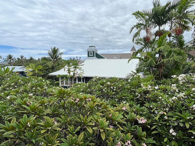 75-5776 Kuakini Hwy Unit 339, Kailua-Kona, HI 96740 - view of side of home featuring metal roof