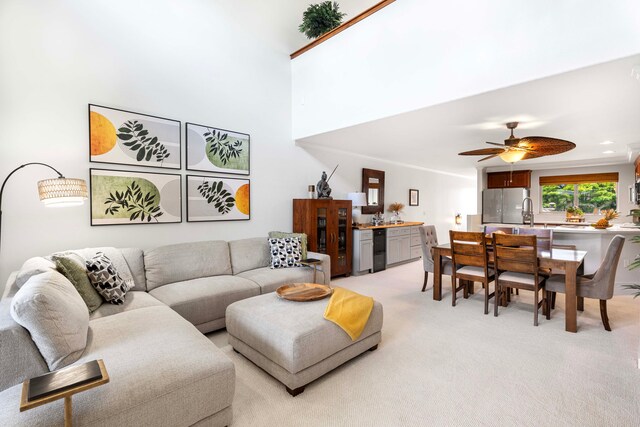 68-1122 Na Ala Hele Rd Unit Q23, Kamuela, HI 96743 - living area with light carpet, bar, and a ceiling fan