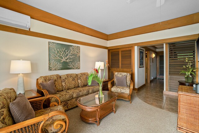 2253 Poipu Rd Unit 312, Koloa, HI 96756 - living area featuring a wall unit AC and ceiling fan