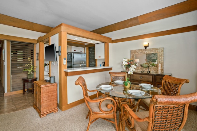 2253 Poipu Rd Unit 312, Koloa, HI 96756 - dining area featuring baseboards and carpet flooring