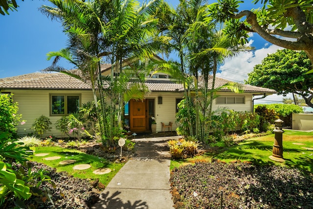 1871 Pee Rd Unit 1, Koloa, HI 96756 - view of front of property featuring a tiled roof