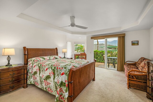 4141 Lei O Papa Rd Unit 50, Princeville, HI 96722 - bedroom with light colored carpet, a raised ceiling, access to exterior, and ceiling fan