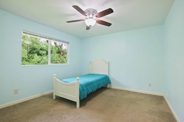 14-3556 Seadrift Rd, Pahoa, HI 96778 - carpeted bedroom with baseboards and ceiling fan
