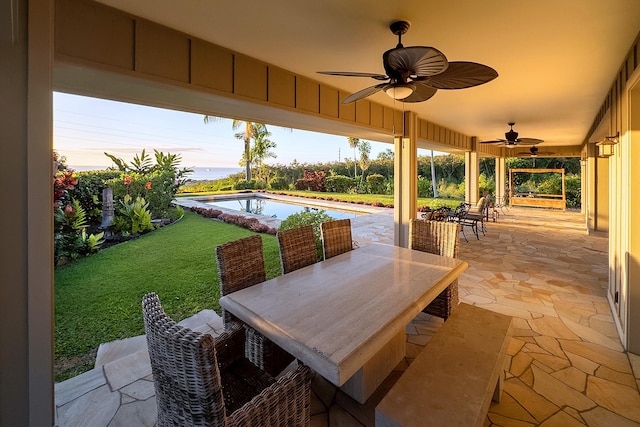 76-149 Kamehamalu St, Kailua-Kona, HI 96740 - view of patio featuring ceiling fan, outdoor dining area, and an outdoor pool