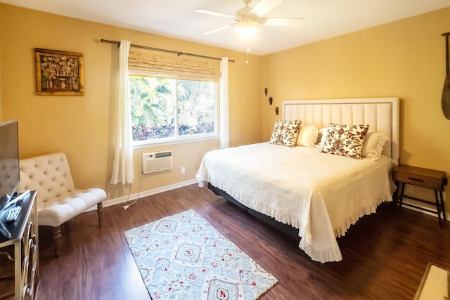 76-149 Kamehamalu St, Kailua-Kona, HI 96740 - bedroom with a wall mounted AC, dark wood finished floors, baseboards, and a ceiling fan
