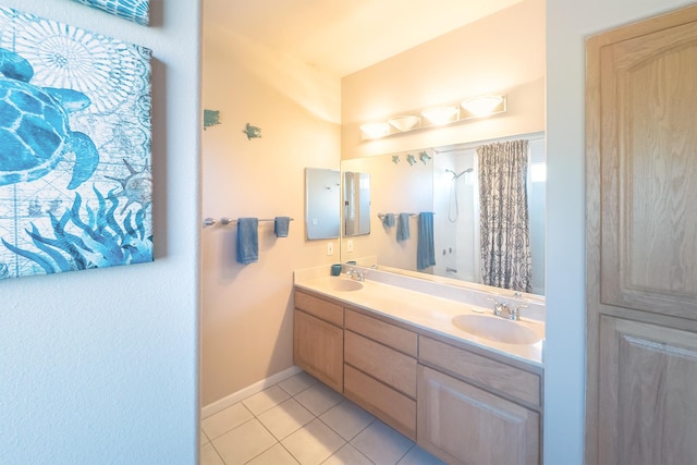 76-149 Kamehamalu St, Kailua-Kona, HI 96740 - bathroom with double vanity, tile patterned flooring, curtained shower, and baseboards