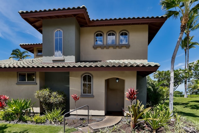 68-1125 Kaniku Dr Unit 706, Kamuela, HI 96743 - mediterranean / spanish home featuring stucco siding and a tiled roof