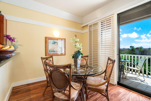 2253 Poipu Rd Unit 326, Koloa, HI 96756 - dining room with wood finished floors and baseboards