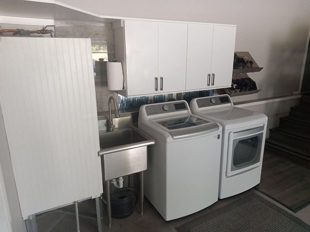 94-1770 Kaulua St, Naalehu, HI 96772 - washroom featuring cabinet space and washer and dryer
